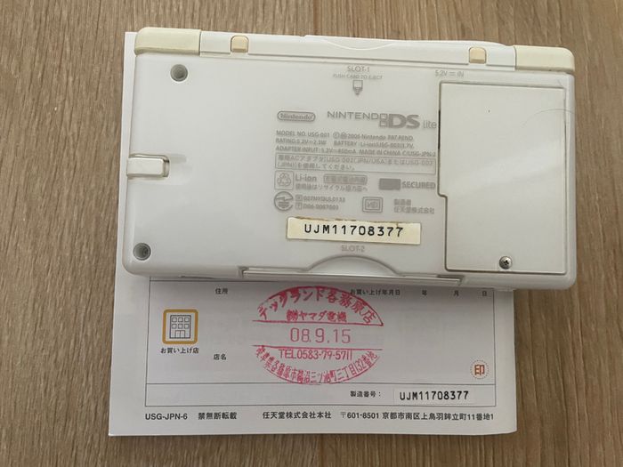 Modded Nintendo DS Lite crystal white USG 001 boxed with manual with Flash Card 32gb with Games and retro games (Neo Geo, Nes, Gameboy Color, Atari.