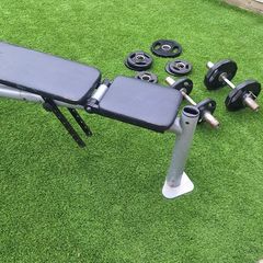 Adjustable bench and dumbells