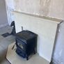 marble fireplace and stove Image 2