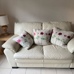 Cream leather two seater sofa