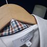 Mans white shirt... Image 8