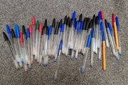 lifetime supply of black blue red mostly bic pens