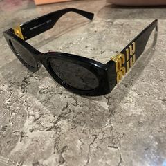 Miu Miu black cat-eye sunglasses