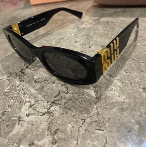 Miu Miu black cat-eye sunglasses
