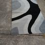 High quality 100% wool  rug, grey and black abstract design. Image 3