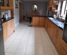 Solid oak kitchen shaker style American style samsung fridge freezer and electric hob.