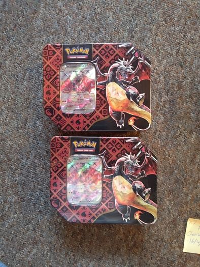 Pokemon TCG Scarlet and Violet Paldean Fates Charizard ex Tins