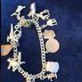 Silver Vintage Hallmarked Charm Bracelet with 14 Charms Image 5
