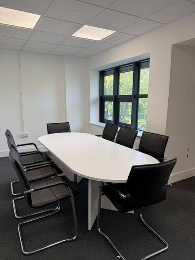 White modern boardroom table  with 8 chairs