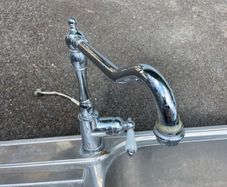 Kitchen sink with tap