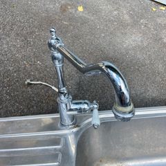 Kitchen sink with tap
