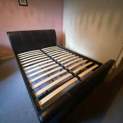 Faux leather king sleigh bed