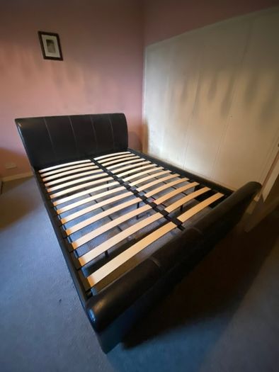 Faux leather king sleigh bed
