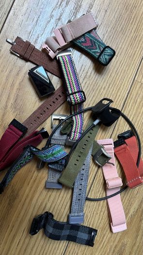 FitBit 4 with several straps