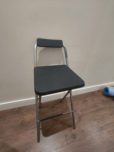 Foldable high stool used as a ladder