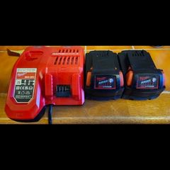 2 x Milwaukee M18 5Ah Batteries with Milwaukee M12-18 FC 12/18V Fast Charger.