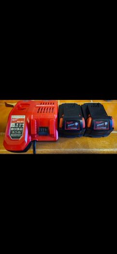 2 x Milwaukee M18 5Ah Batteries with Milwaukee M12-18 FC 12/18V Fast Charger.