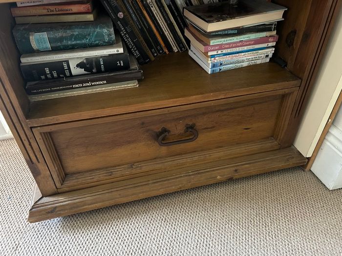 Solid wood bookshelf with bottom drawer