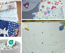 ball pit with balls, blankets, sleepsuits, playmats