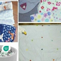 ball pit with balls, blankets, sleepsuits, playmats