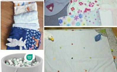 ball pit with balls, blankets, sleepsuits, playmats
