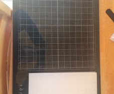 Tim Holts Glass Media Mat