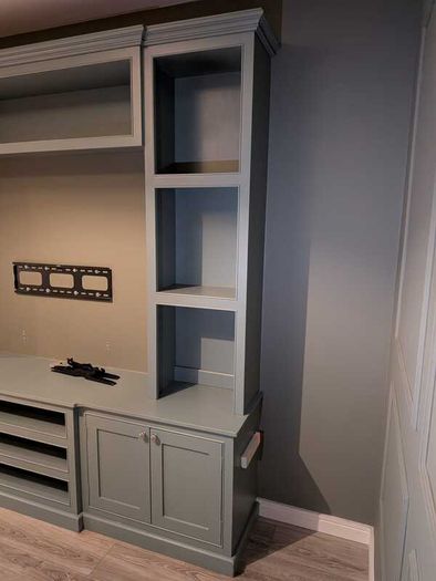 Large custom-built fitted media wall / TV unit in very good used condition.