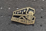 Skeleton enamel pin