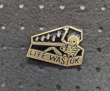 Skeleton enamel pin