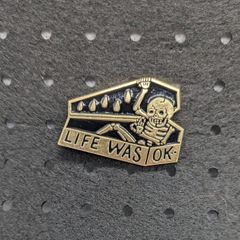 Skeleton enamel pin