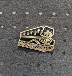 Skeleton enamel pin