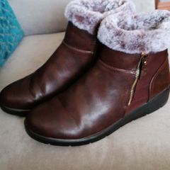 Boots  size 6 and a half  dunnes small tiny mark on one. Worn once