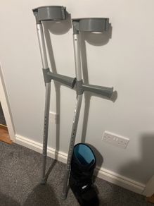 Pair of crutches and orthopedic boot