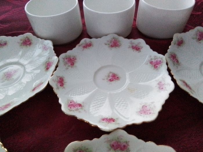 Six Pretty China Saucers