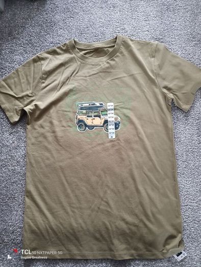 NEW.boy's t-shirt . Size 33/34