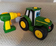 Tractor toy with drill