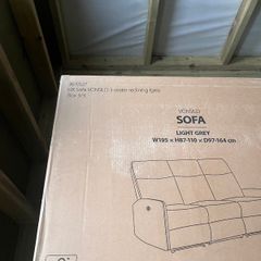 3 seater reclining sofa. Light grey.