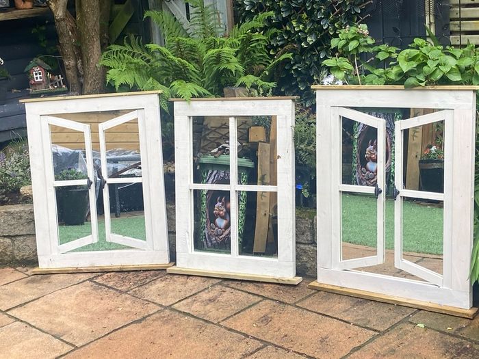 Garden mirror reflection window