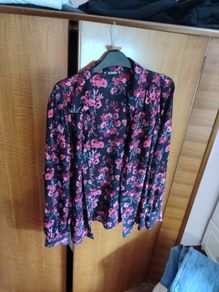 Black blouse with pink flower pattern