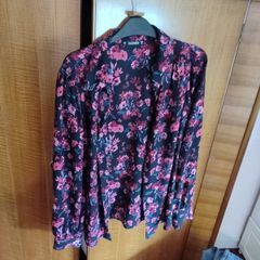 Black blouse with pink flower pattern