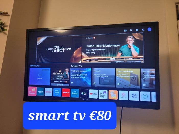 Tv, table, shelves, chair, excersize bike, armchair
