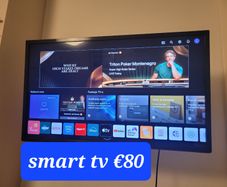 Tv, table, shelves, chair, excersize bike, armchair
