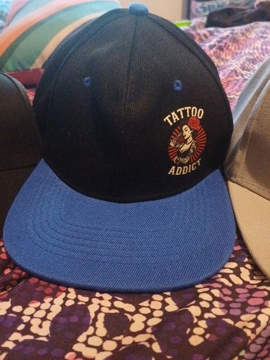 1 man utd baseball cap,,2 snapback caps 13e each or 3 for 30