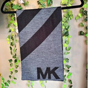 Authentic Michael Kors reversible knit scarf in charcoal black/heather grey with oversized MK logo detail.