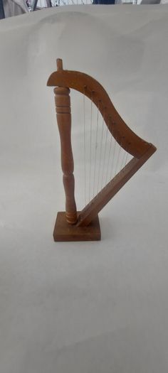 handcrafted wooden display harp ,,lovely display item for any man cave pub restaurant etc etc etc, buyer collects or pays postage.
