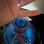 Blue gunpowder gin bottle with cork string lights Image 3