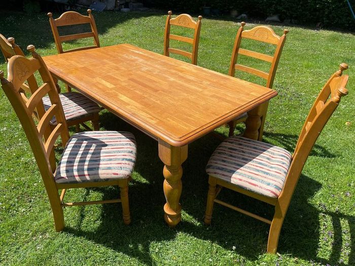 Solid table and 6 chairs. Good condition