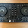Pioneer DJ DDJ FLX4 with headphones Image 2