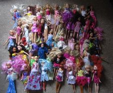 Barbie and barbie type dolls all dressed, 54 of them