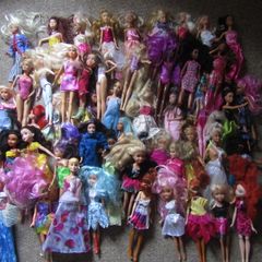 Barbie and barbie type dolls all dressed, 54 of them